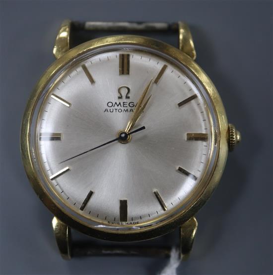 A gentlemans 1940s 750 yellow metal Omega automatic wrist watch, movement c. 28.10 RA, no strap.